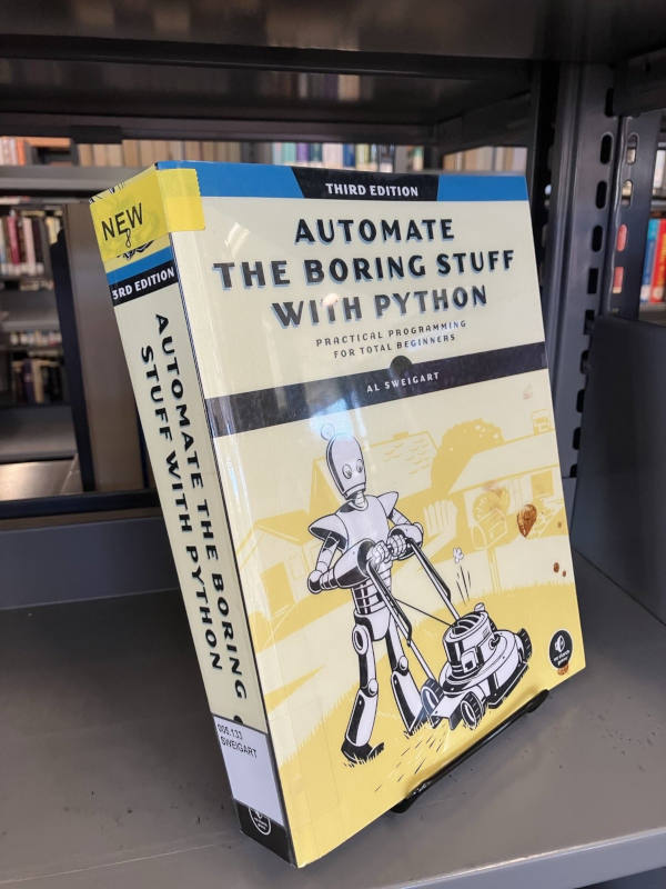 photo of a new book on a library bookshelf